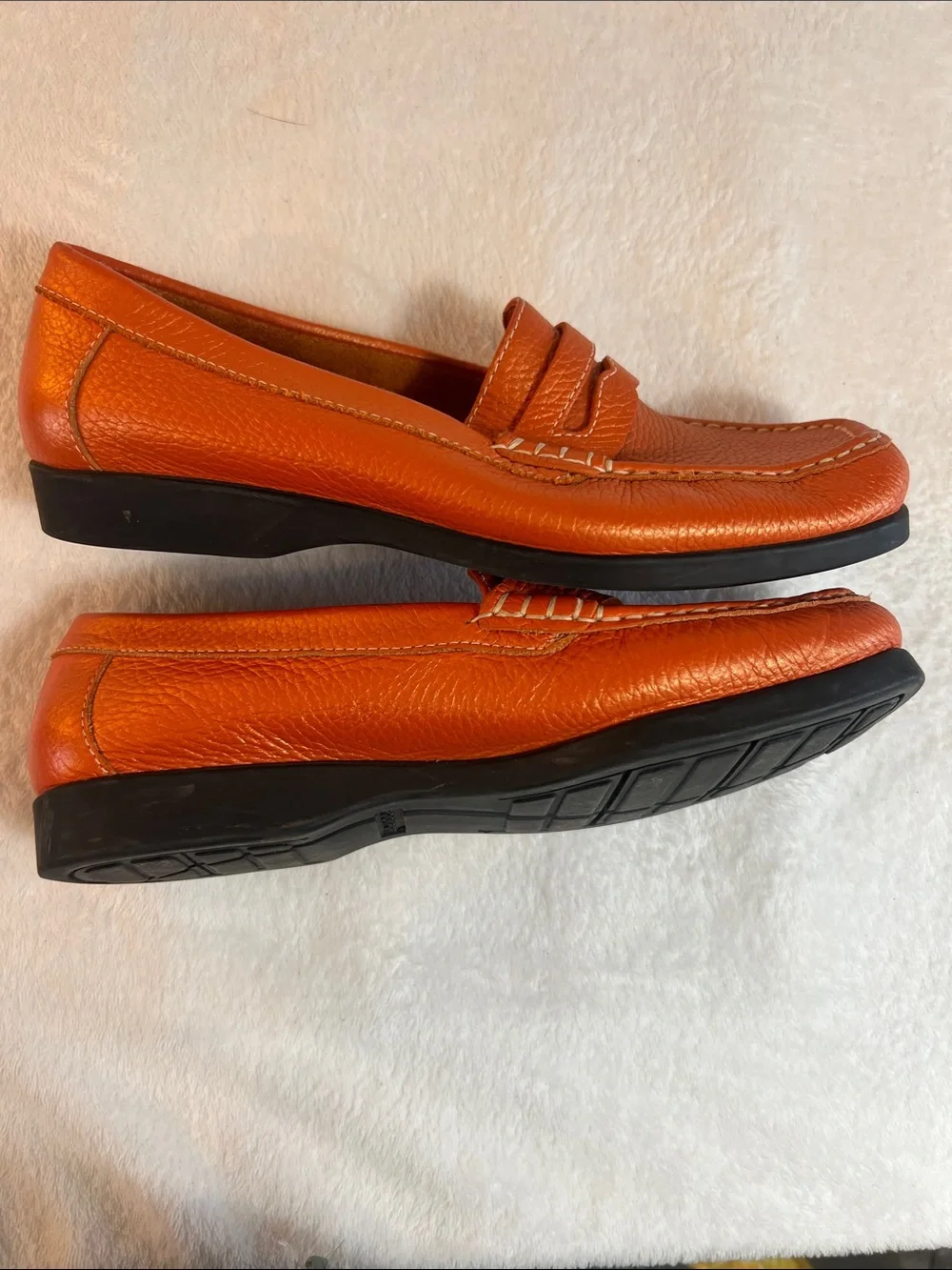 Rockport women’s orange pebbled leather square toe penny loafers
